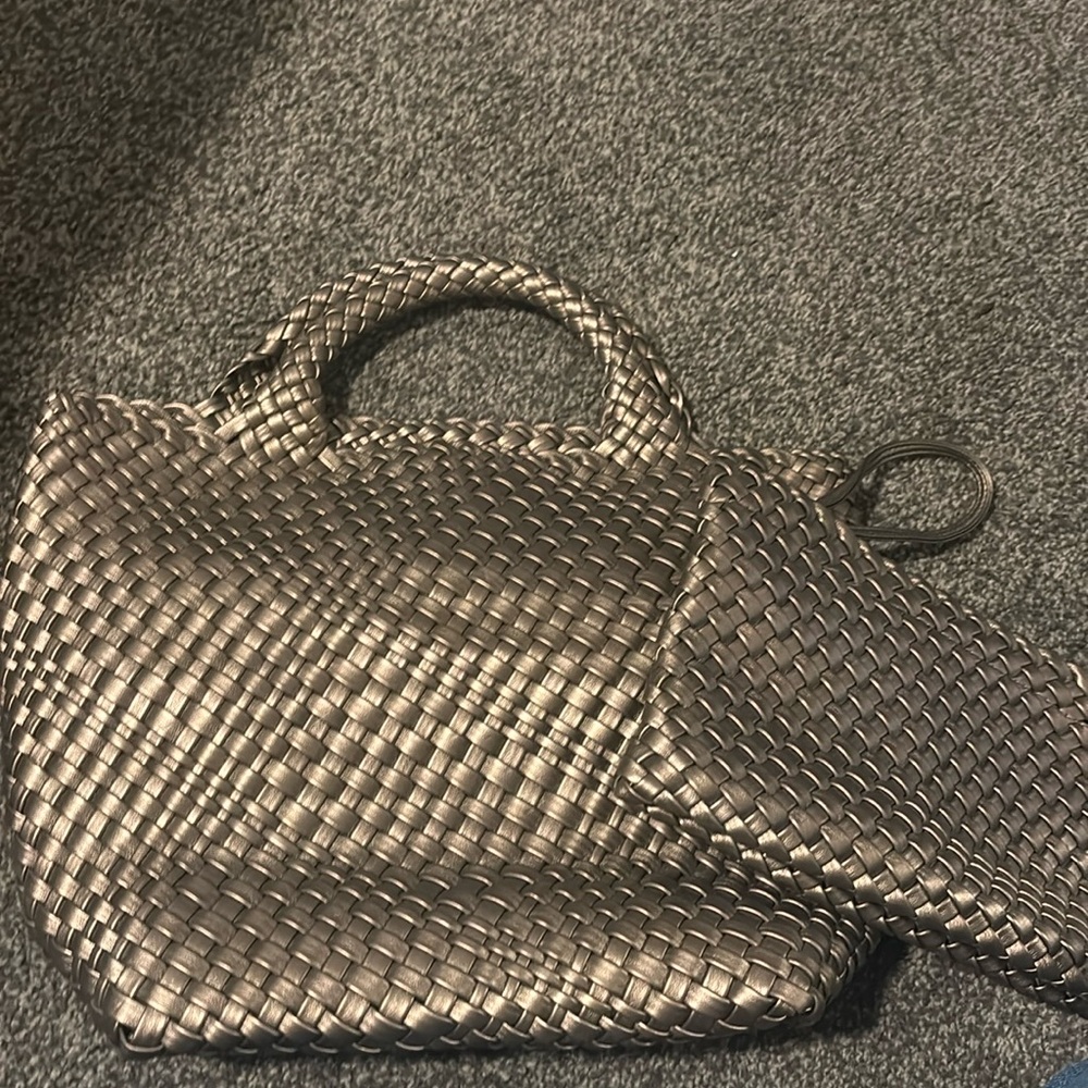 Woven metallic handbag with internal detachable clutch